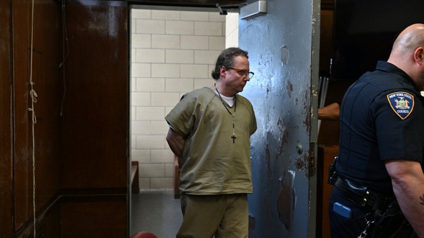 CORRECTS TO HEMPHILL, NOT HEMPHIL – Ryan Hemphill is escorted to court in New York on Thursday, April 24, 2025, for his arraignment on sexual assault charges.
