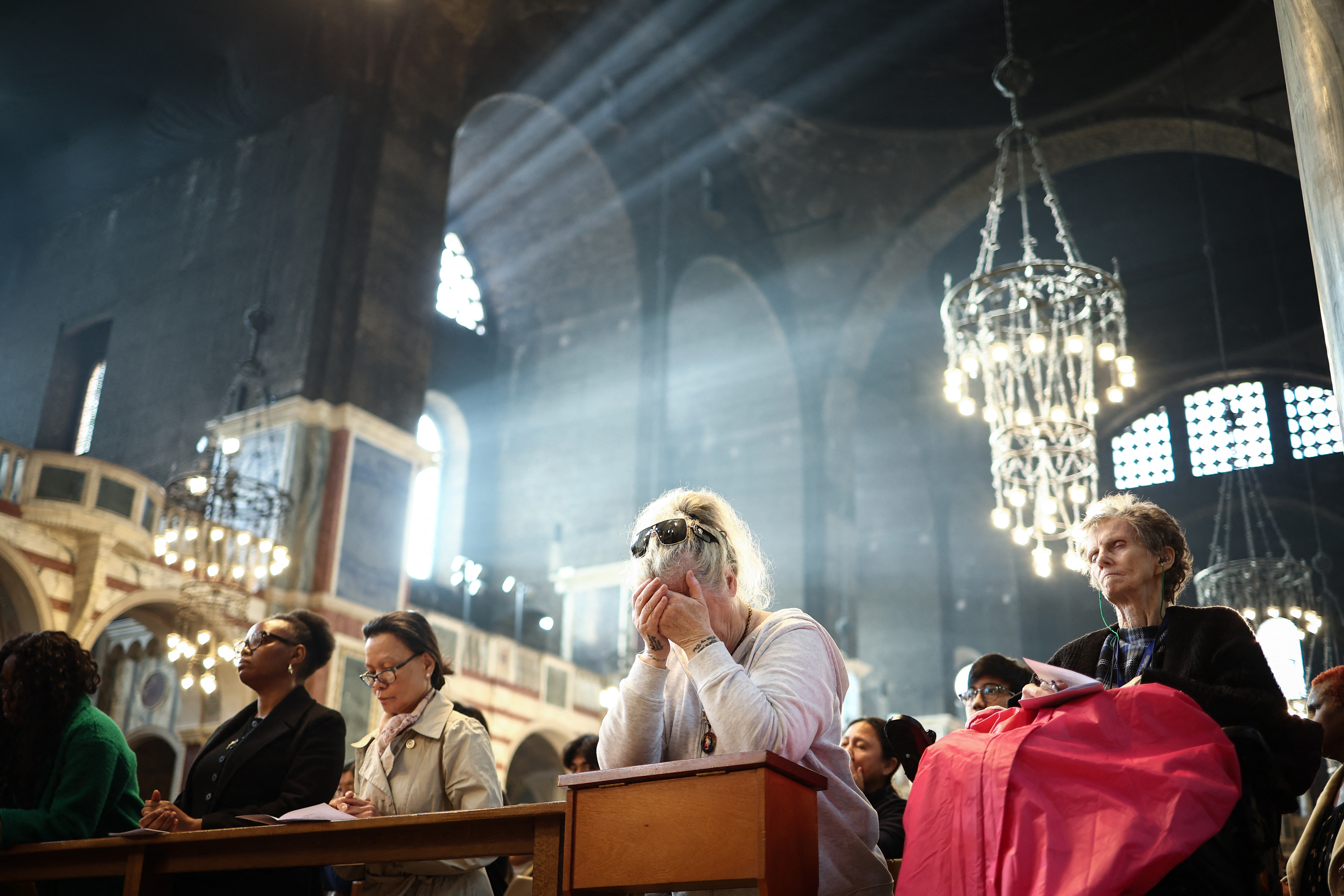 Photos: World reacts to death of Pope Francis
